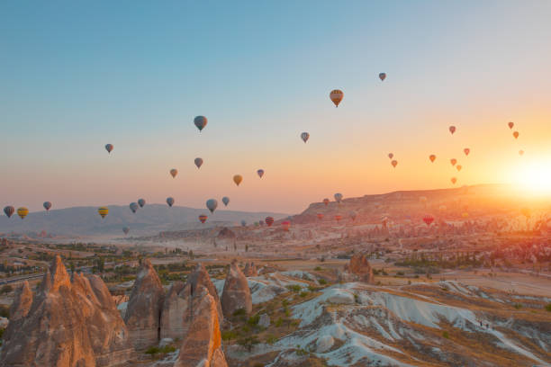 istock Hot air balloon flying over spectacular Cappadocia 1496450171