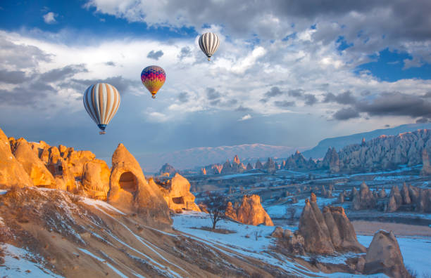 istock Hot air balloon flying over spectacular Cappadocia 1496450474