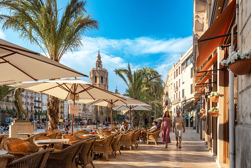 Panoramic scene at Plaza de la Virgen in Ciutat Vella area of Valencia Spain on afternoon.