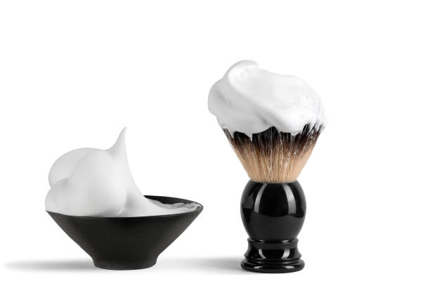 istock Shaving brush and shaving foam isolated on a white background 1496455767