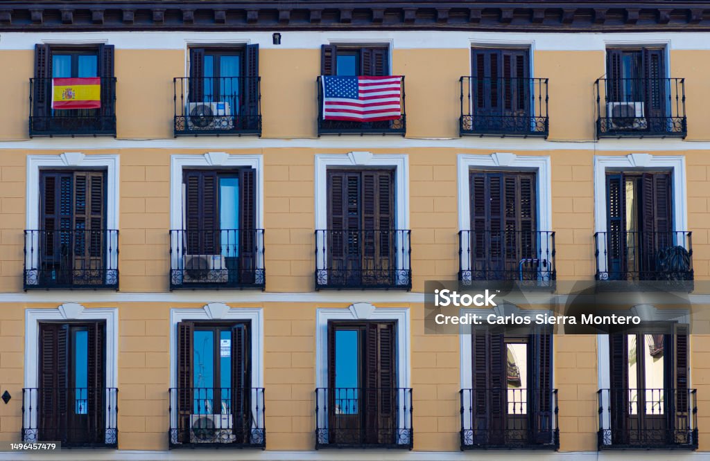 Flag In Window Flags On Windows Stock Photo - Download Image Now - Balcony, Building ...