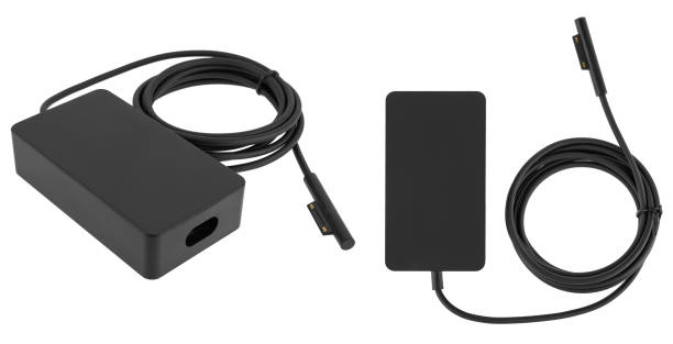 istock Laptop power adapter, white background in insulation 1496459527