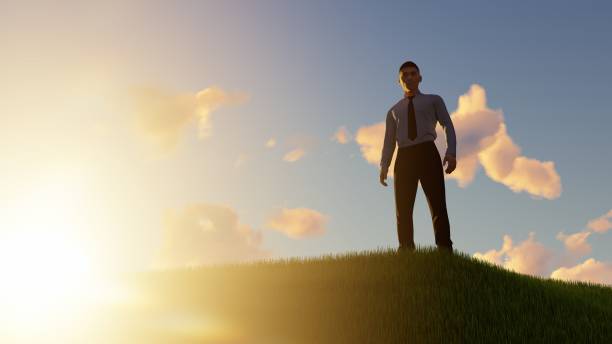 istock Happy Businessman outdoors on a grassy hill 1496464847