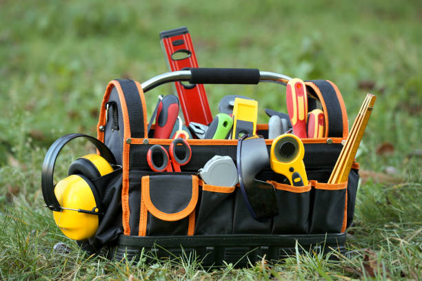 istock Bag with different tools for repair on grass outdoors 1496466479