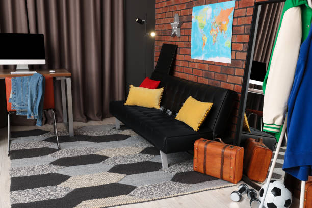 close up of a sofa with a blanket and a pillow. interior background with a sofa. vintage decoration