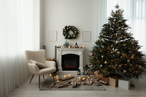 Cosy room with fireplace decorated for Christmas