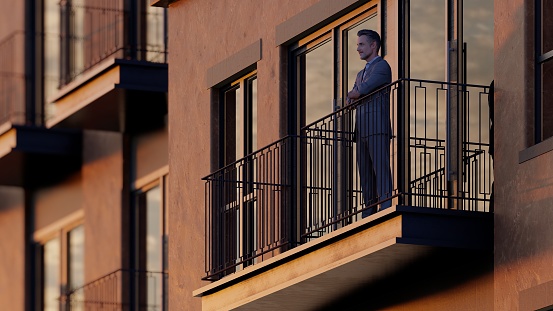 Success is in the air. a mature businessman standing on the office balcony.