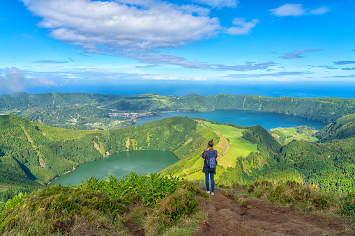 One women at the viewpoint around the caldera on São Miguel island in the Azores