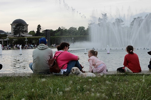 Poland, Wroclaw, May 2023. People relax on the weekend near the Wroclaw Multimedia Fountain