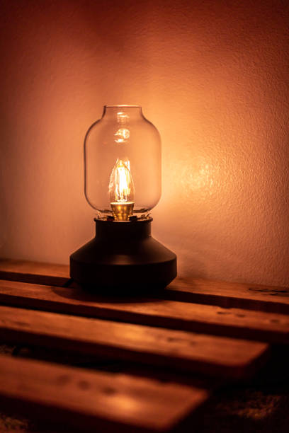 istock Low Lit Electric Lamp Lantern Wooden Pallets Indoor 1496477912