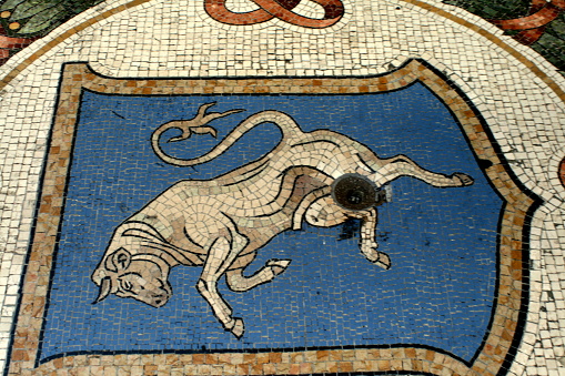 Mosaic bull figure in Galleria Vittorio Emanuele II gallery