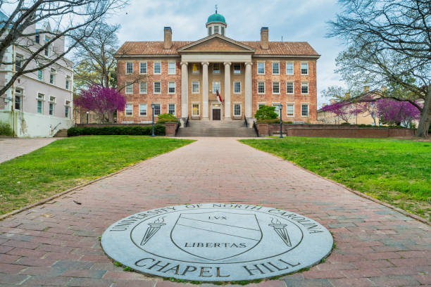 University of North Carolina at Chapel Hill UNC South Building on the University of North Carolina at Chapel Hill campus, North Carolina, USA on a cloudy day. university of north carolina stock pictures, royalty-free photos & images
