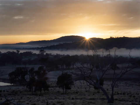 Foggy sunrise over hills near Canberra ACT