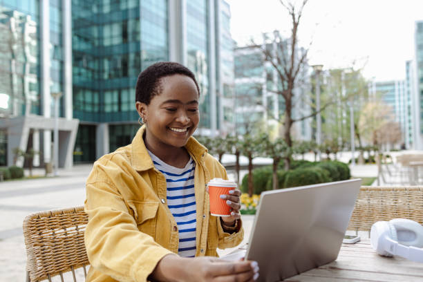 istock A young Black woman is attending online classes in the cafeteria 1496485488