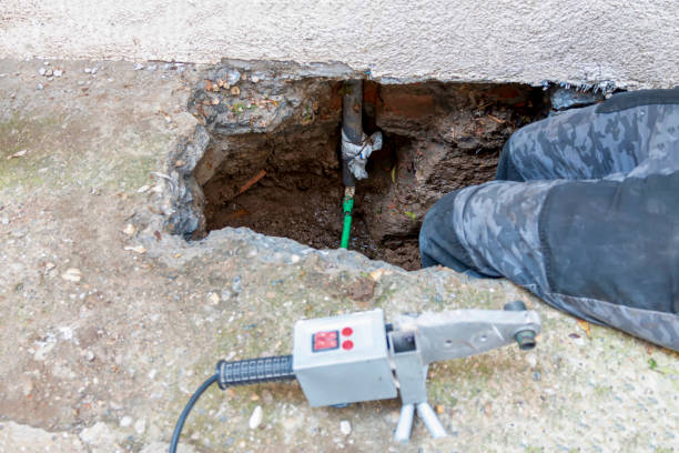 istock The pipe is broken or burst pipe and is being repaired 1496491525