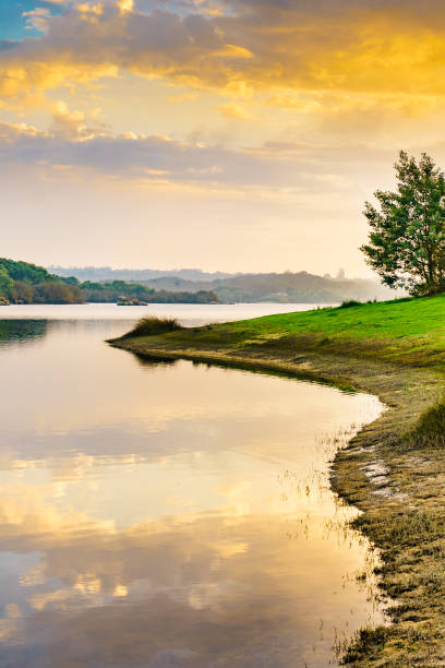 sunset over autumn lake water - castelo de vide imagens e fotografias de stock