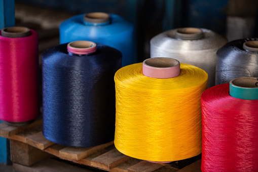 Manufacture of spools of colored and neutral polyester threads from plastic material - Buenos Aires - Argentina