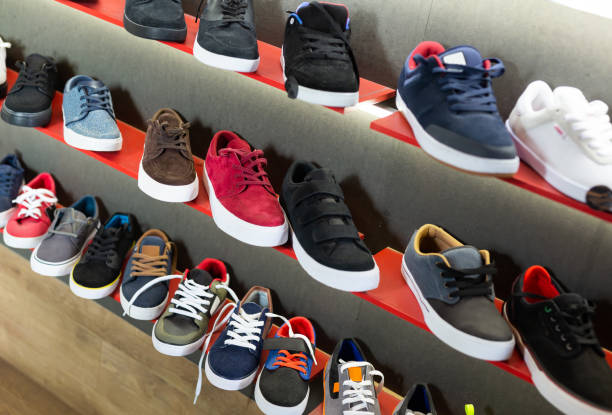istock Casual men shoes on shelves in store 1496497819