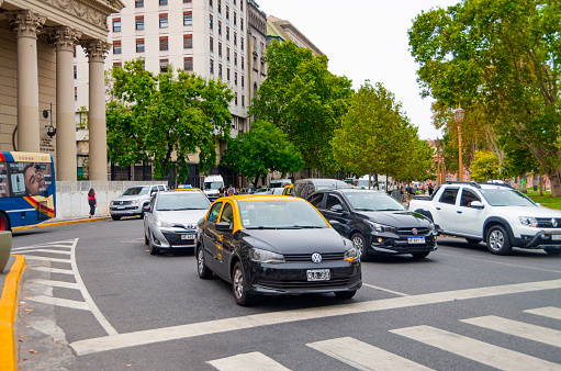 Taxis and other vehicles stopped in front of a pedestrian crossing in the center of Buenos Aires, Argentina, Latin America. January 08, 2023 Buenos Aires, Argentina