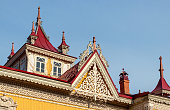 Old house with firebirds in Tomsk, russian traditional wood carving