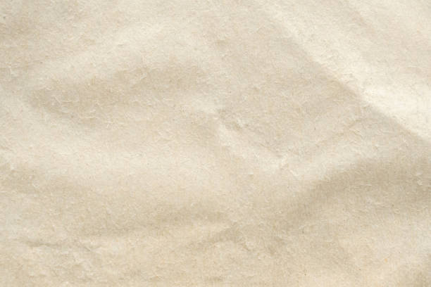 istock Abstract old white crumpled and creased recycle paper texture background 1496508136