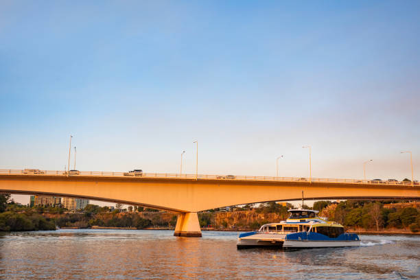 istock Ferry and Riverside Expressway Bridge in Brisbane 1496521903