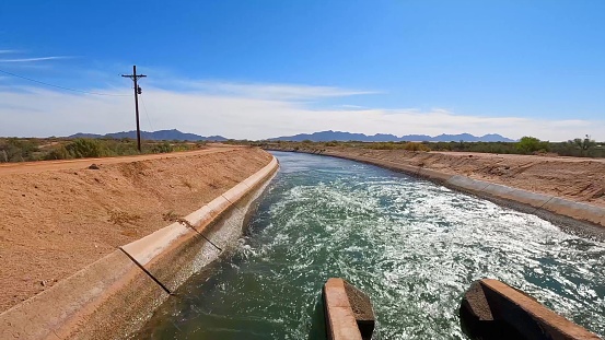 Arizona's residents thirst is quenched by hundreds of miles of water canals, primarily filled by the Colorado River.