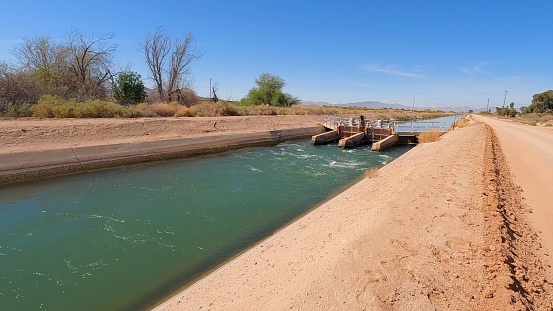 Arizona's residents thirst is quenched by hundreds of miles of water canals, primarily filled by the Colorado River.