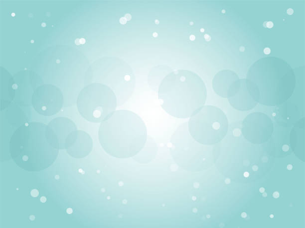 istock Abstract background material with beautiful polka dots floating in pale water_turquoise blue 1496530573