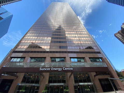 Calgary, Alberta, Canada. Jun 6, 2023. A wide angle horizontal view of the Suncor tower building.