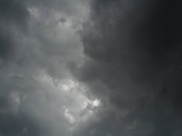 Cumulonimbus cloud formations on tropical sky , Nimbus moving , Abstract background from natural phenomenon and gray clouds hunk , Thailand