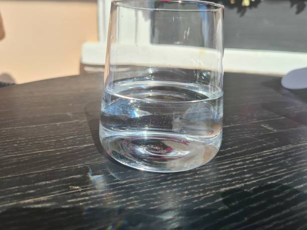 istock Glass of clean cold water on table in a cafe 1496536999
