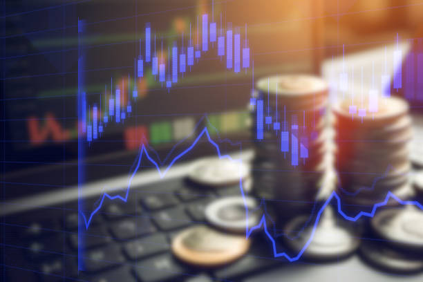 Coins, the stock market and the economy stock photo