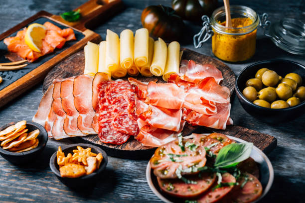 istock Appetizers with different antipasti, charcuterie, snacks 1496550557