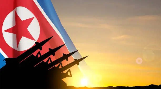 Vector illustration of Silhouette of missiles against the sunset