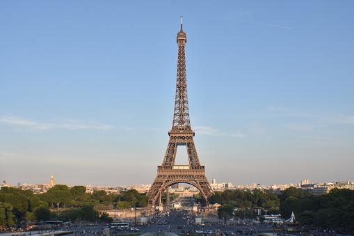 Paris, France - July 16, 2019:  Eiffel Tower peaceful afternoon sunset view in Paris, France