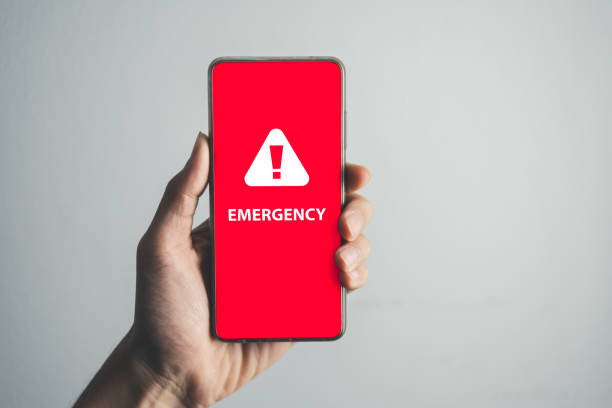 istock Man got emergency alert. emergency accident hot line 911 concept. 1496558495