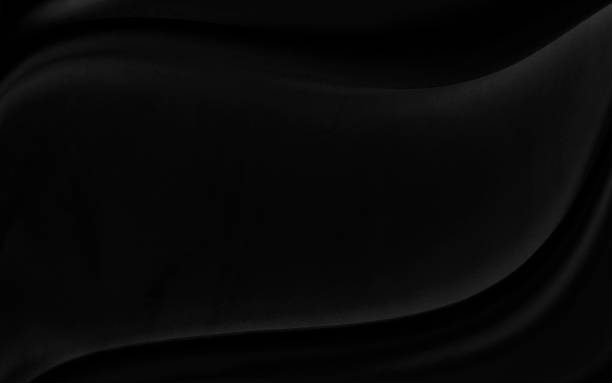 istock Black gray satin dark fabric texture luxurious shiny that is abstract silk cloth background with patterns soft waves blur beautiful. 1496559822