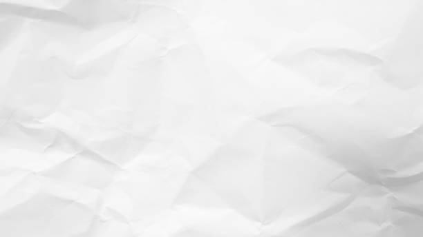 istock White Paper Texture background. Crumpled white paper abstract shape background with space paper recycle for text 1496563379