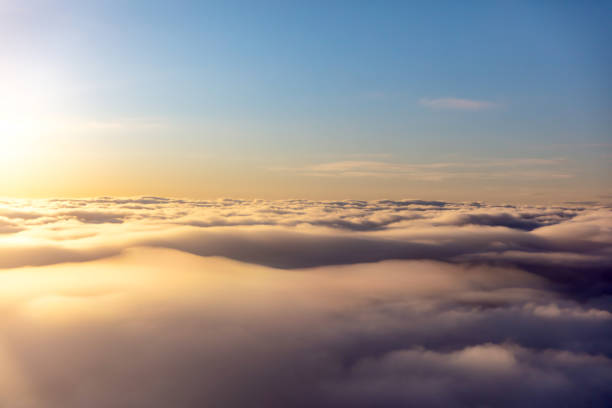 istock Beautiful evening view above the clouds 1496564181