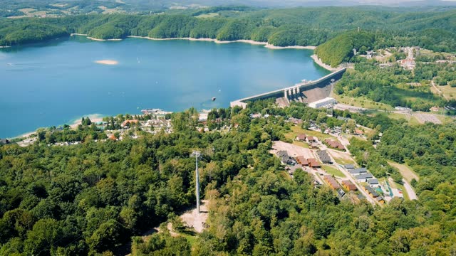Holidays in Poland - dam on the San River with Lake Solina with upper cable cars