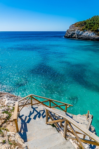 A scenic view of the Mallorca shoreline with crystal blue water, Spain.