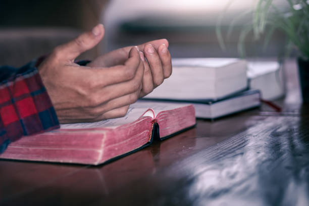 istock Sunday praying and Bible reading, Christian concept. 1496572984