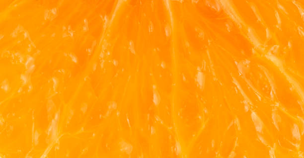 istock Macro shot of orange fruit texture. Food background 1496573435