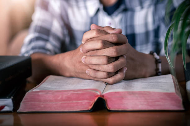 istock Sunday pray and read Bible, Christian concept. 1496573649