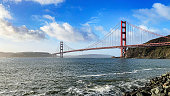 The Golden Gate Bridge seen from bay area and the discovery museum and observation deck in San Francisco, USA. Emblematic bridge of the US state of California.