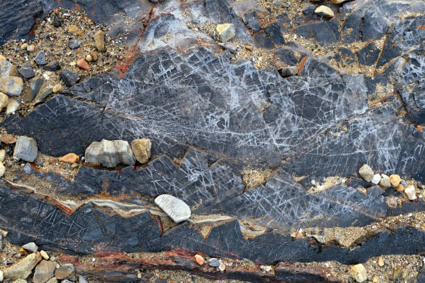 istock Ancient black rocks in Lai Chi Chong, Hong Kong 1496579321