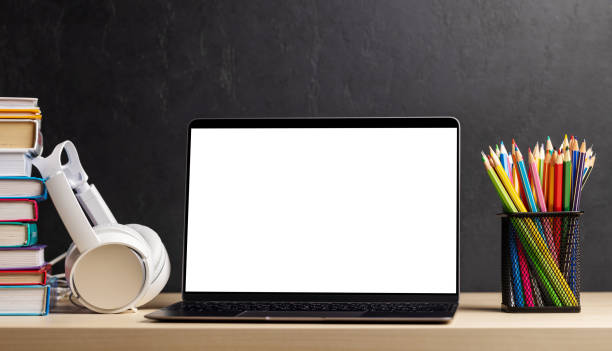 istock Laptop, books and pencils on desk 1496581182