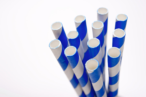 Close up of disposable drinking straws made of cardboard