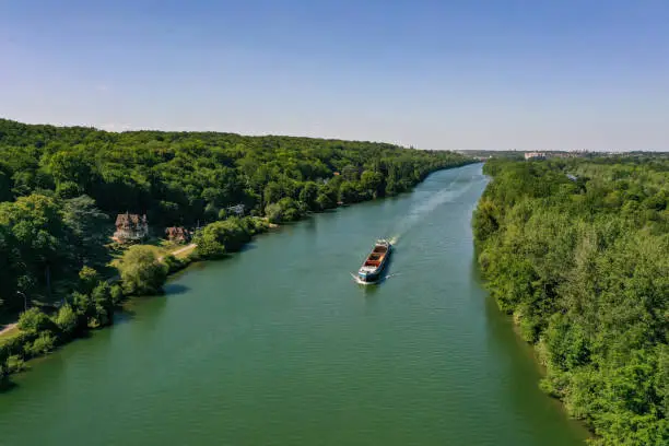 Photo of aerial view on the Seine with a barge in Seine et Marne